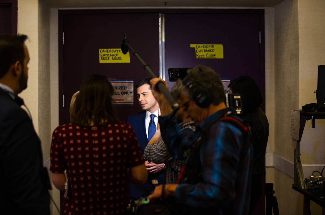 Democratic presidential candidate former South Bend Mayor Pete Buttigieg walks into the media s ...