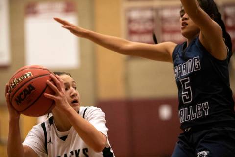 Desert Oasis's Isabella Jaramillo (2) looks to pass to a teammate as Spring Valley's Chelsea Ca ...