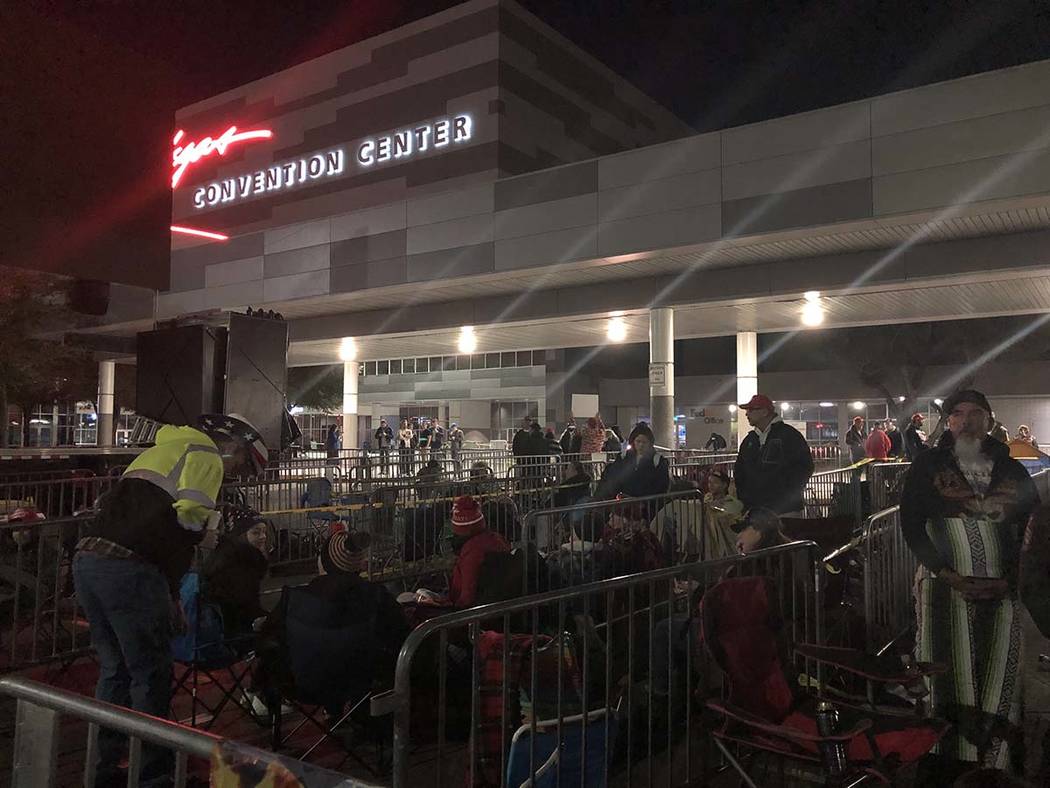 A crowd camps outside the Las Vegas Convention Center on Thursday, Feb. 20, 2020, where Preside ...