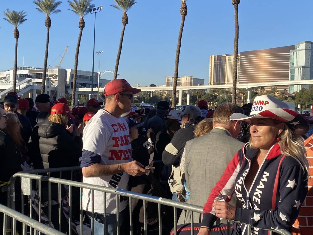 A long line of people wait Friday, Feb. 21, 2020, to gain entrance to the Las Vegas Convention ...