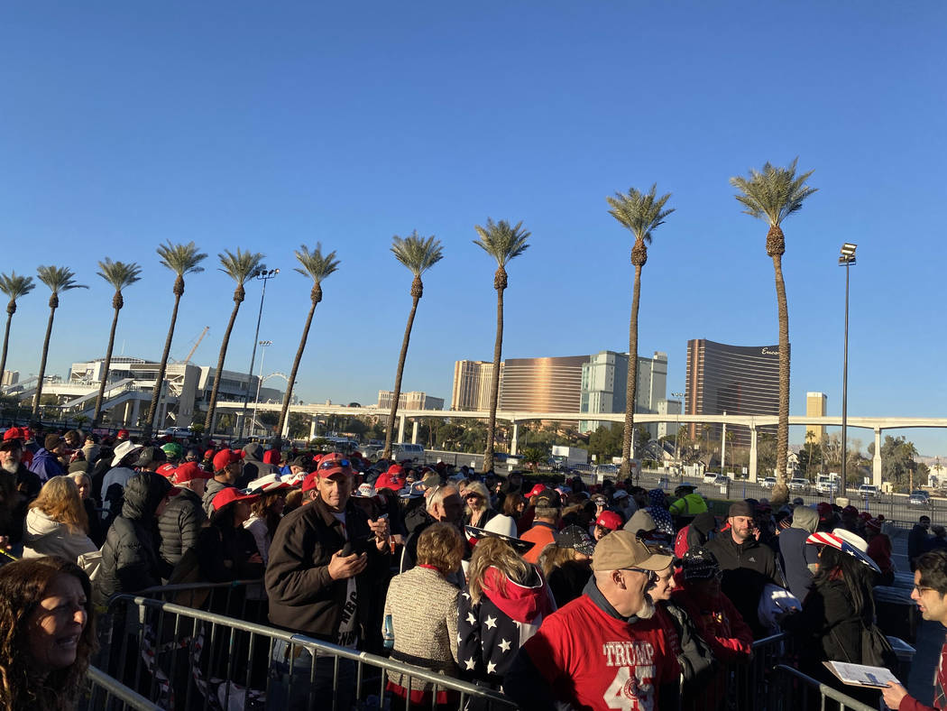 A long line of people wait Friday, Feb. 21, 2020, to gain entrance to the Las Vegas Convention ...