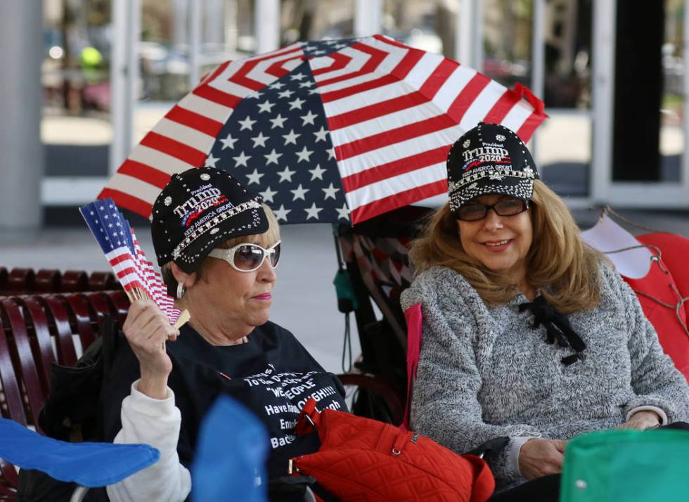 Lynn Caplan, left, and Nancy Curtin, both of Las Vegas, camp outside the Las Vegas Convention C ...