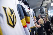 Charmaine Pennington, left, shops for Golden Knights jerseys on Wednesday, April 18, 2018, at T ...