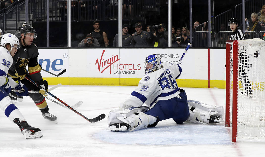Vegas Golden Knights center Paul Stastny (26) scores against Tampa Bay Lightning goalie Andrei ...