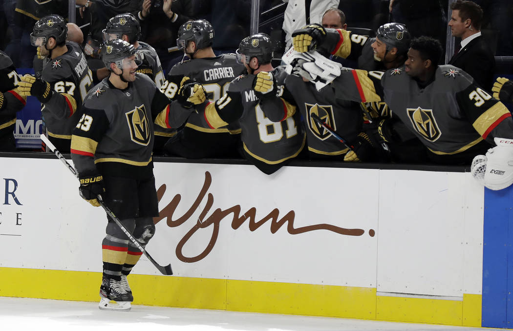 Vegas Golden Knights defenseman Alec Martinez (23) celebrates after scoring against the Tampa B ...