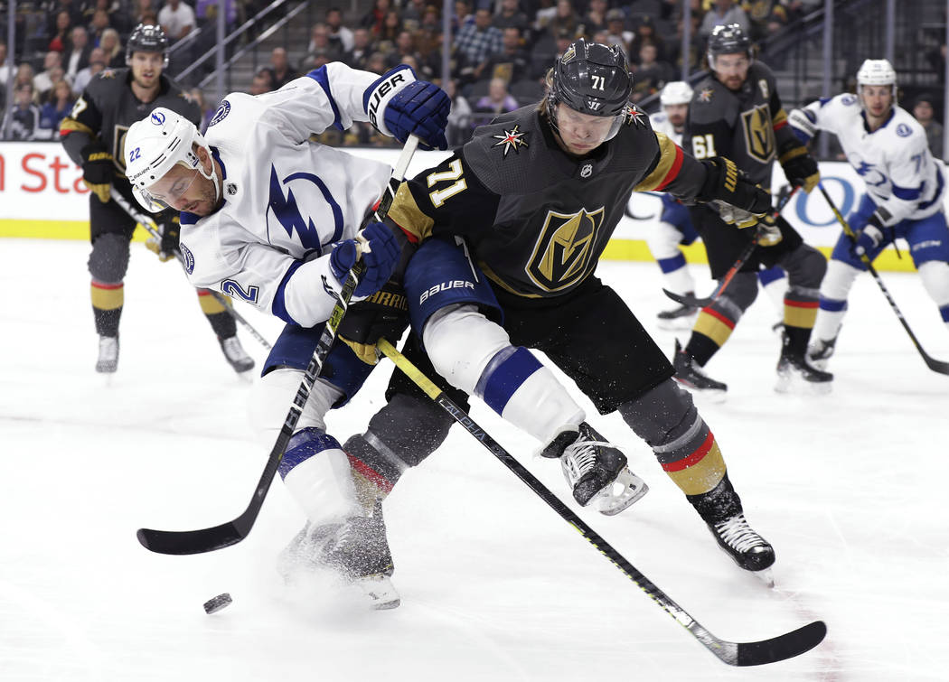 Tampa Bay Lightning defenseman Kevin Shattenkirk (22) and Vegas Golden Knights center William K ...