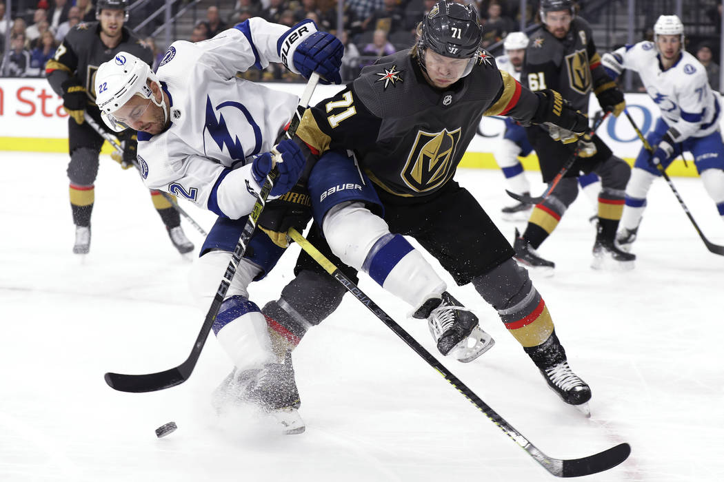 Tampa Bay Lightning defenseman Kevin Shattenkirk (22) and Vegas Golden Knights center William K ...