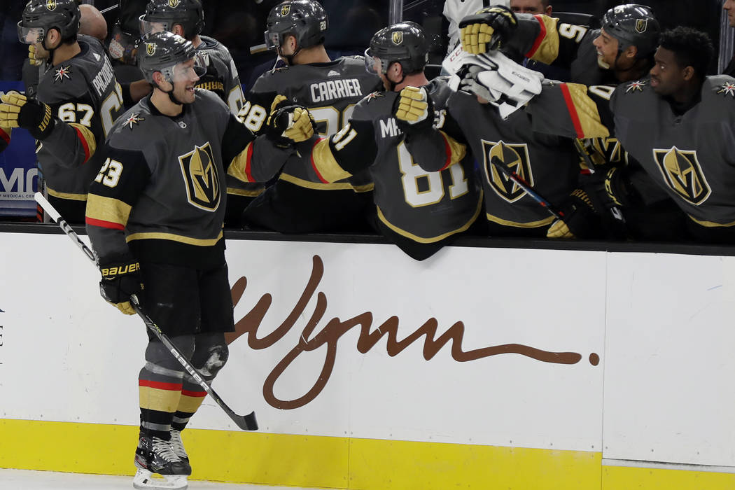 Vegas Golden Knights defenseman Alec Martinez (23) celebrates after scoring against the Tampa B ...