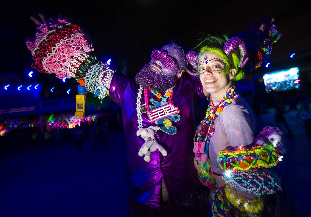 Aaron Ellis, left, and Brittany Pitcock, both of Texas, pose for a photo during the second nigh ...