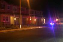 Police investigate a shooting in the 5900 block of Yellow Ridge Avenue in Las Vegas on Thursday ...