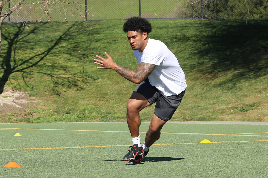 Former UCLA tight end Devin Asiasi runs through drills to prepare for the 2020 NFL Combine at S ...