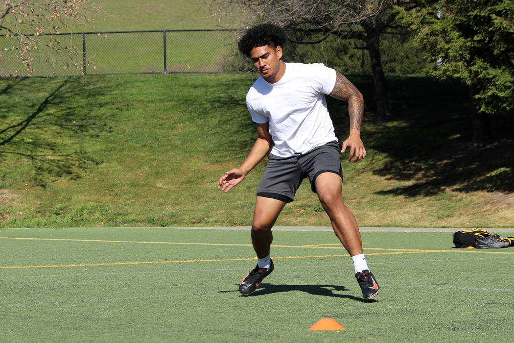 Former UCLA tight end Devin Asiasi runs through drills to prepare for the 2020 NFL Combine at S ...