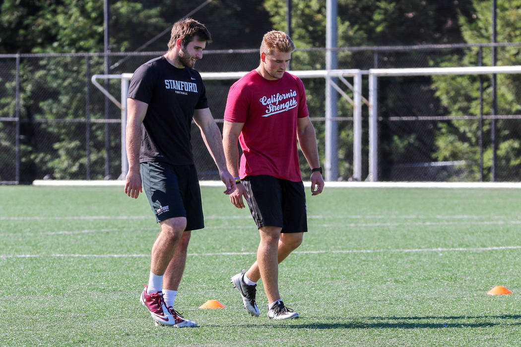 Former Stanford University linebacker Casey Toohill, left, and former University of Wyoming lin ...