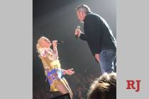 Gwen Stefani and Blake Shelton are shown singing "Nobody But You" at Zappos Theater at Planet H ...