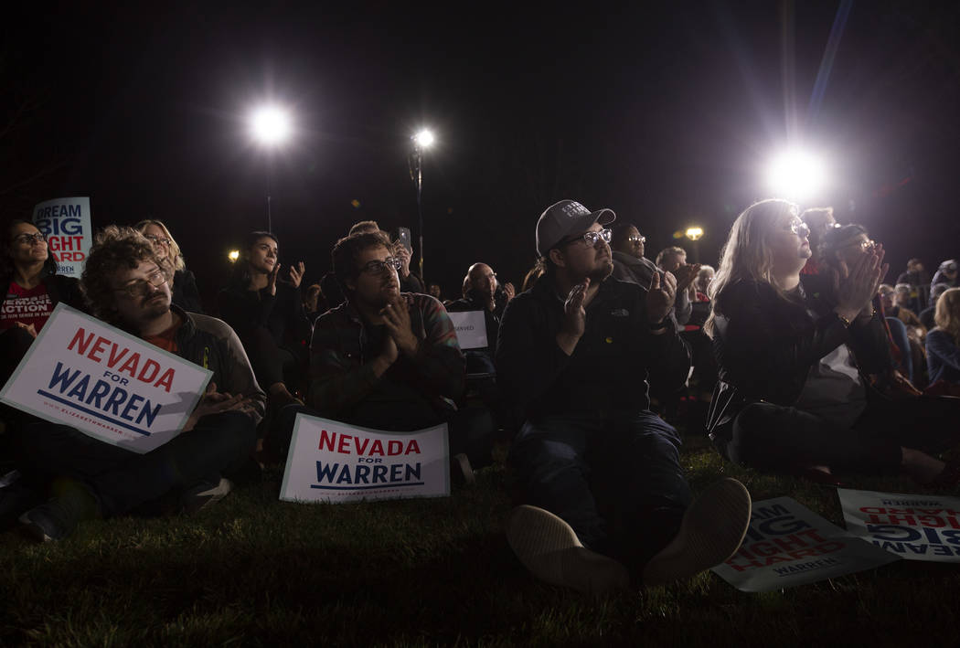 The audience claps for Sen. Elizabeth Warren, D-Mass., at the "Get Out the Caucus Block Pa ...