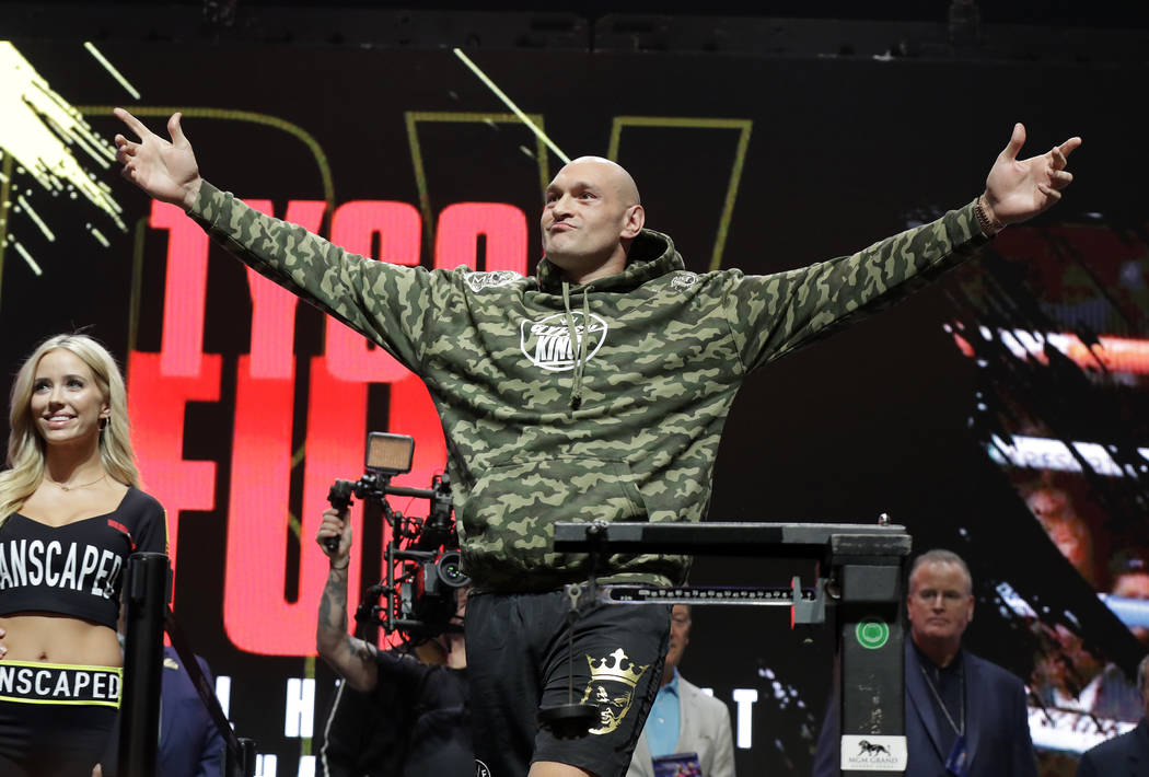 Tyson Fury, of England, arrives at a weigh-in for his WBC heavyweight championship boxing match ...