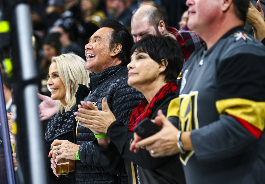 Entertainer Wayne Newton reacts after a Golden Knights goal during the third period of an NHL h ...