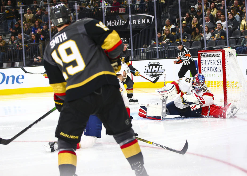 Golden Knights' Reilly Smith (19) shoots to score past Florida Panthers goaltender Sam Montembe ...