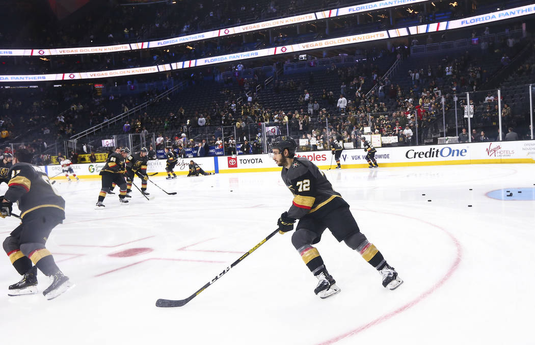 Golden Knights' Gage Quinney (72) skates on the ice while warming up before an NHL hockey game ...