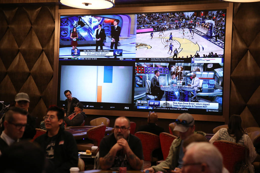 Televisions on the wall of the new poker room at Sahara Las Vegas casino-hotel in Las Vegas, Fr ...