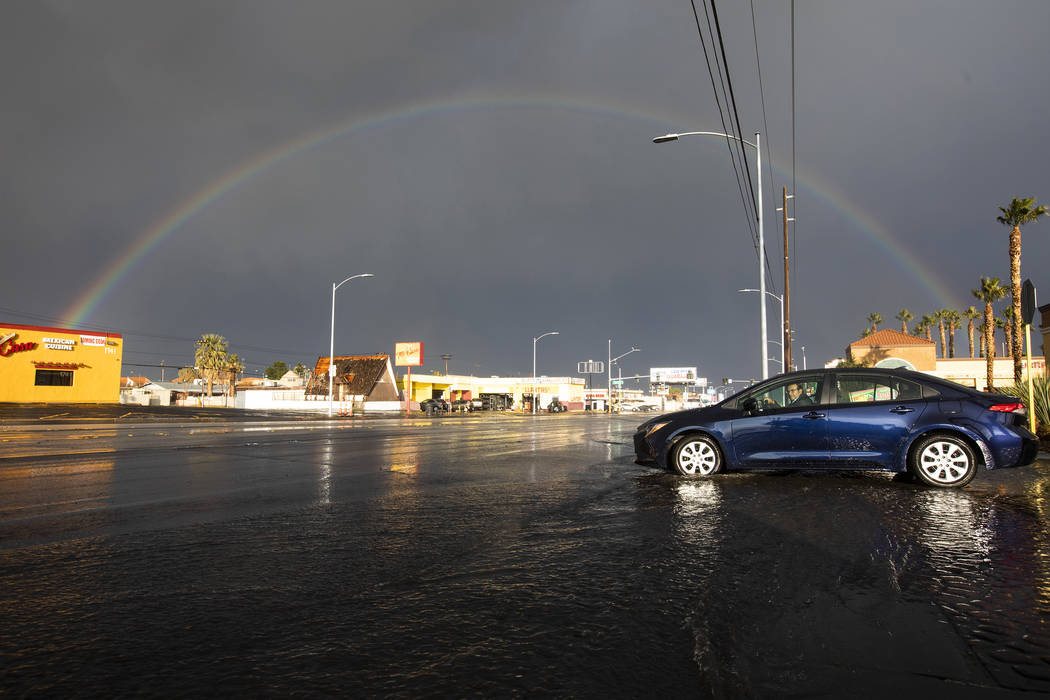 A rainbow appeared after a downpour in Las Vegas, as seen from Charleston Boulevard on Saturday ...