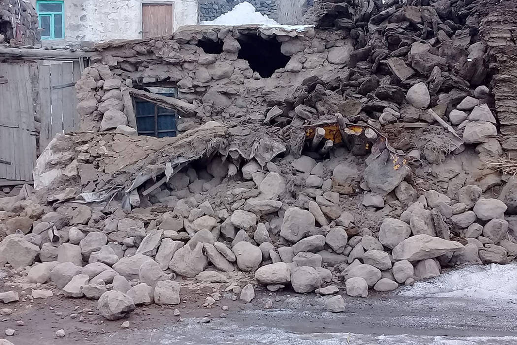 Houses are reduced to rubble after an earthquake hit villages in Baskale in Van province, Turke ...