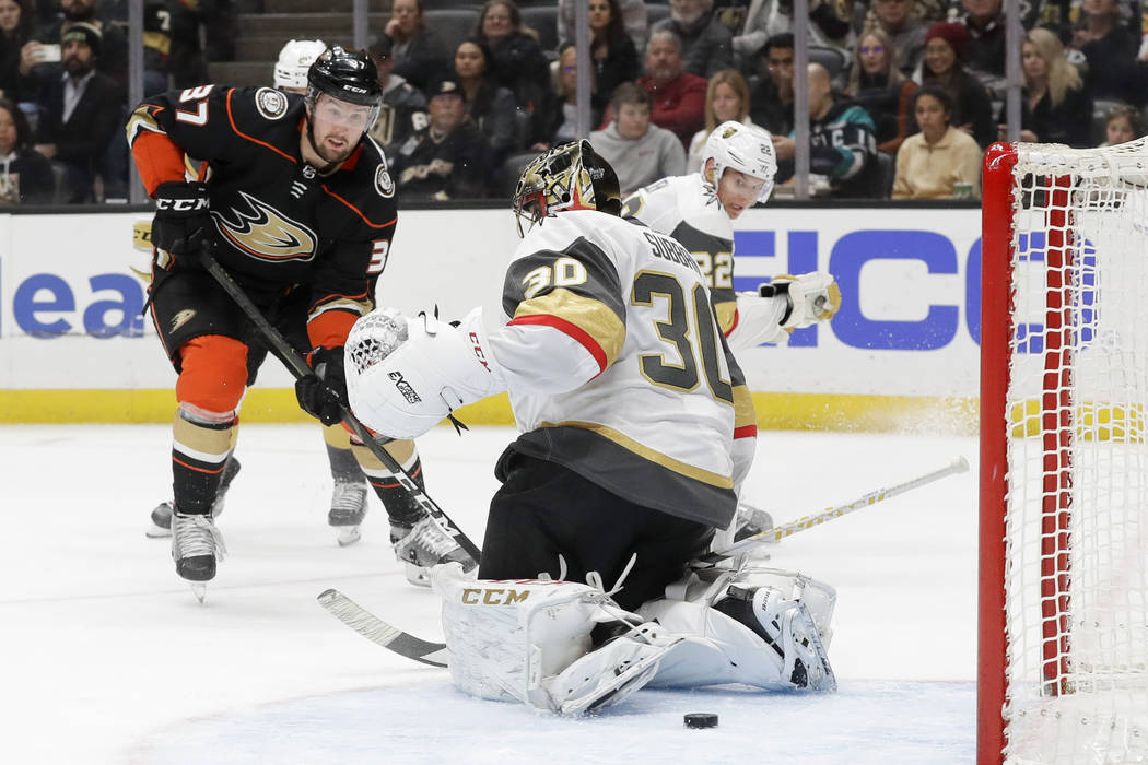 Anaheim Ducks left wing Nick Ritchie, left, scores past Vegas Golden Knights goaltender Malcolm ...