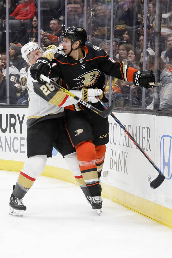 Vegas Golden Knights center Paul Stastny, left, checks Anaheim Ducks defenseman Hampus Lindholm ...