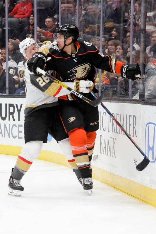 Vegas Golden Knights center Paul Stastny, left, checks Anaheim Ducks defenseman Hampus Lindholm ...