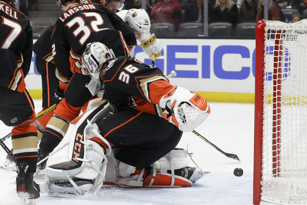Vegas Golden Knights center Patrick Brown (38) scores past Anaheim Ducks goaltender John Gibson ...