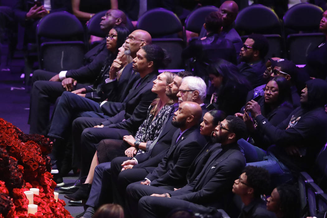 Former Los Angeles Lakers watch during a celebration of life for Kobe Bryant and his daughter G ...