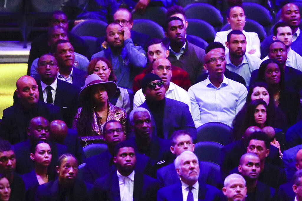 LL Cool J, middle, watches during a celebration of life for Kobe Bryant and his daughter Gianna ...