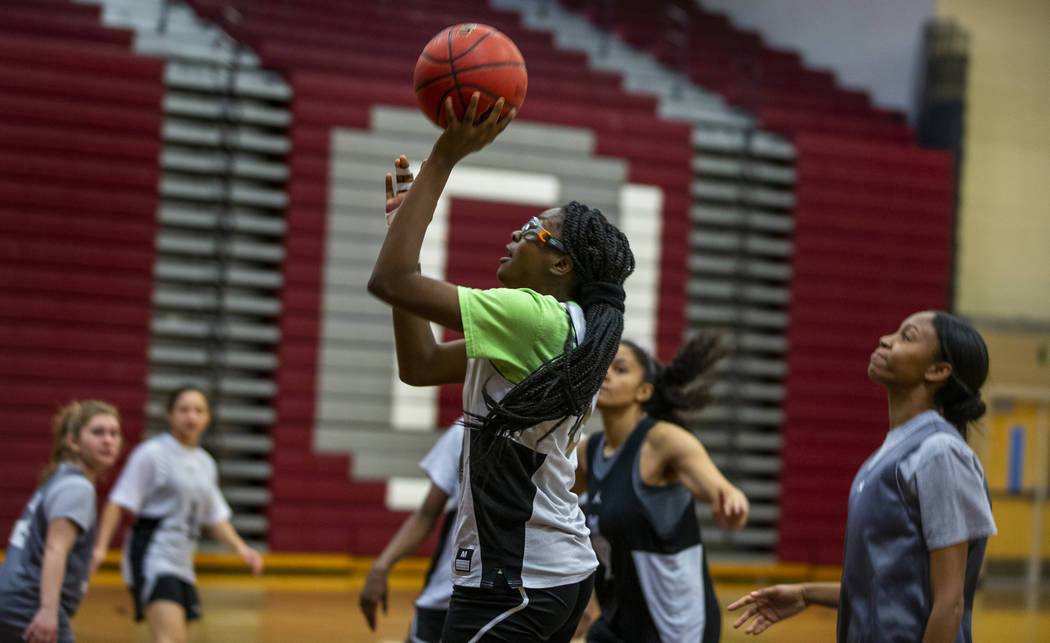 Player Jordan Stroud sets up a shot as the Desert Oasis girls basketball team practices on Mond ...