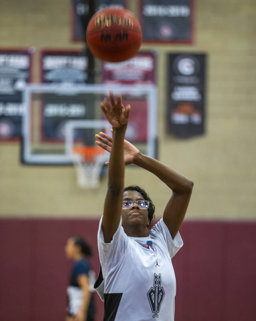Player Desi-Rae Young shoots another free throw as the Desert Oasis girl's basketball team prac ...
