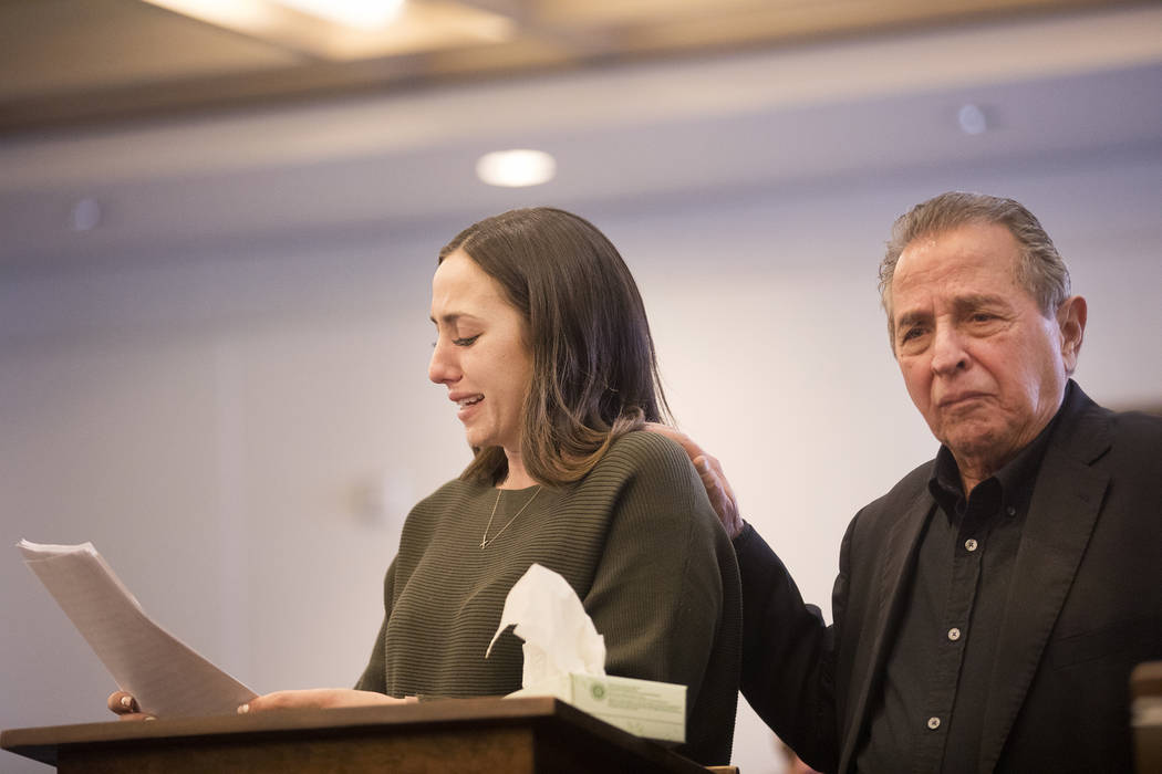 Allie Rossie, sister of A.J. Rossi, gives her victim impact statement next to her father Albert ...
