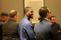 A jury found Raekwon Robertson, center, guilty of first-degree murder, attempted robbery and co ...