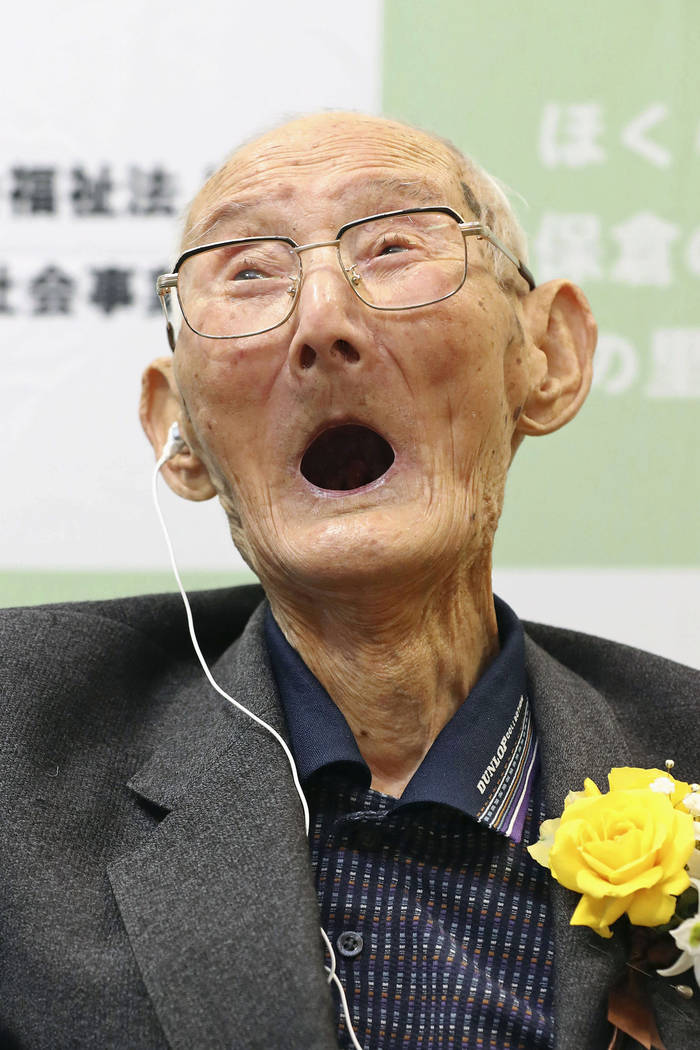 Chitetsu Watanabe, 112, celebrates after being awarded as the world's oldest living male by Gui ...