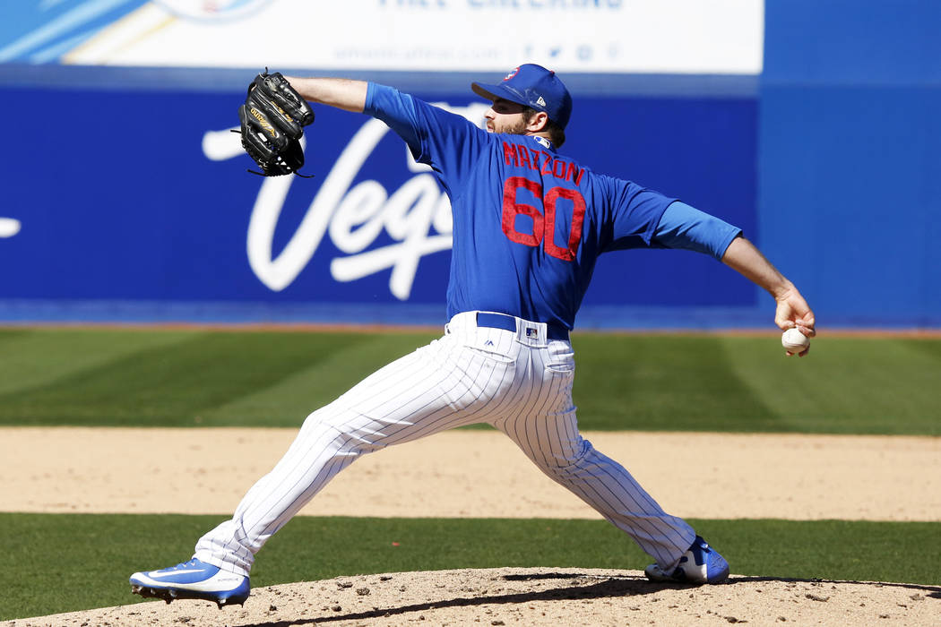 Chicago Cubs' Cory Mazzoni (60) pitches during the annual Big League Weekend baseball game agai ...