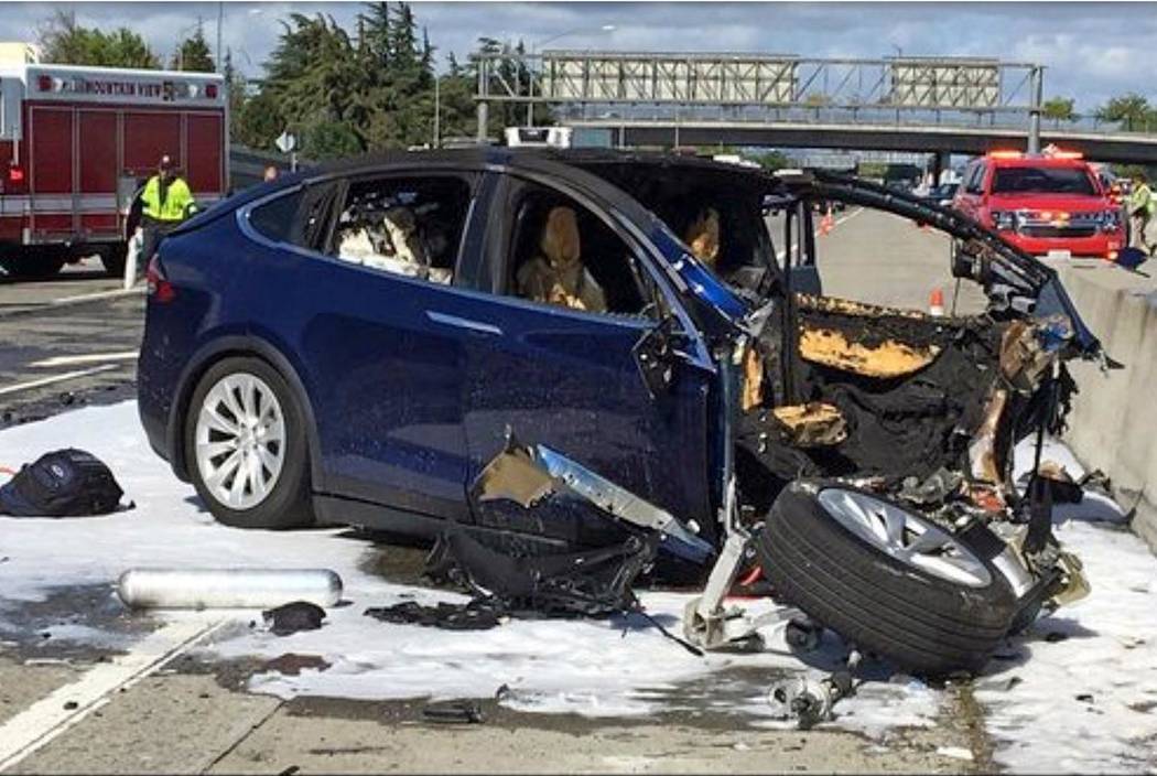 In this March 23, 2018, file photo provided by KTVU, emergency personnel work a the scene where ...