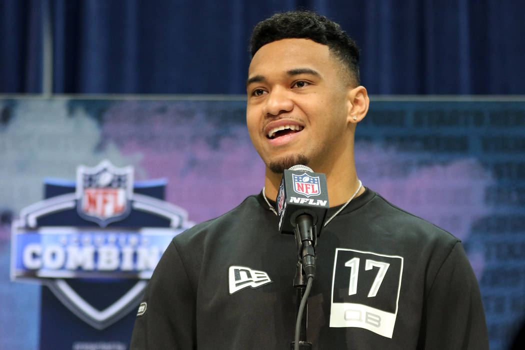 Alabama quarterback Tua Tagovailoa speaks during a news conference at the NFL scouting combine ...