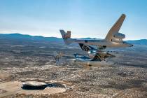 This photo provided by Virgin Galactic shows the Virgin Galactic's VSS Unity flying over Spacep ...