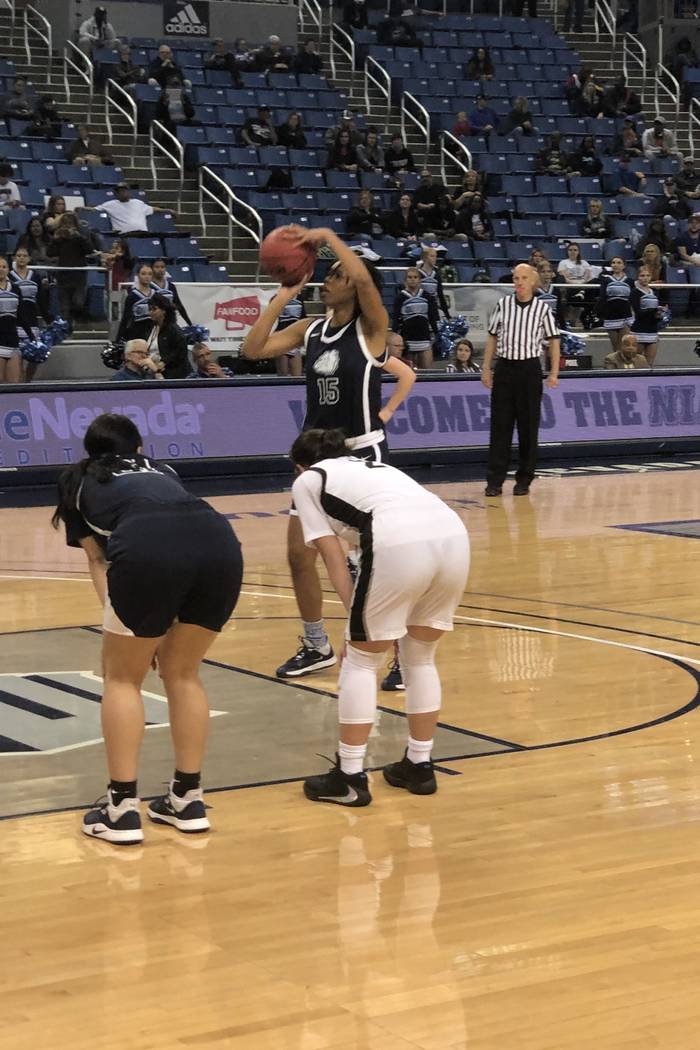 Centennial senior guard/forward Daejah Phillips shoots a free throw during the first quarter of ...