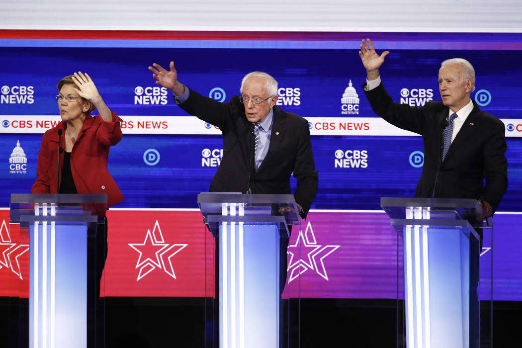 From left, Democratic presidential candidates, Sen. Elizabeth Warren, D-Mass., Sen. Bernie Sand ...