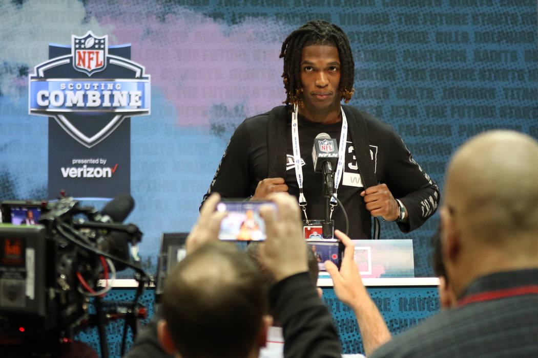 Oklahoma wide receiver Ceedee Lamb takes questions during a news conference at the NFL scouting ...