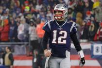 FILE - In this Saturday, Jan. 4, 2020 file photo, New England Patriots quarterback Tom Brady wa ...