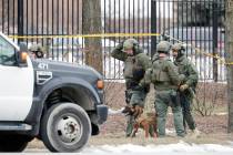 Police work outside the Molson Coors Brewing Co. campus in Milwaukee on Wednesday, Feb. 26, 202 ...