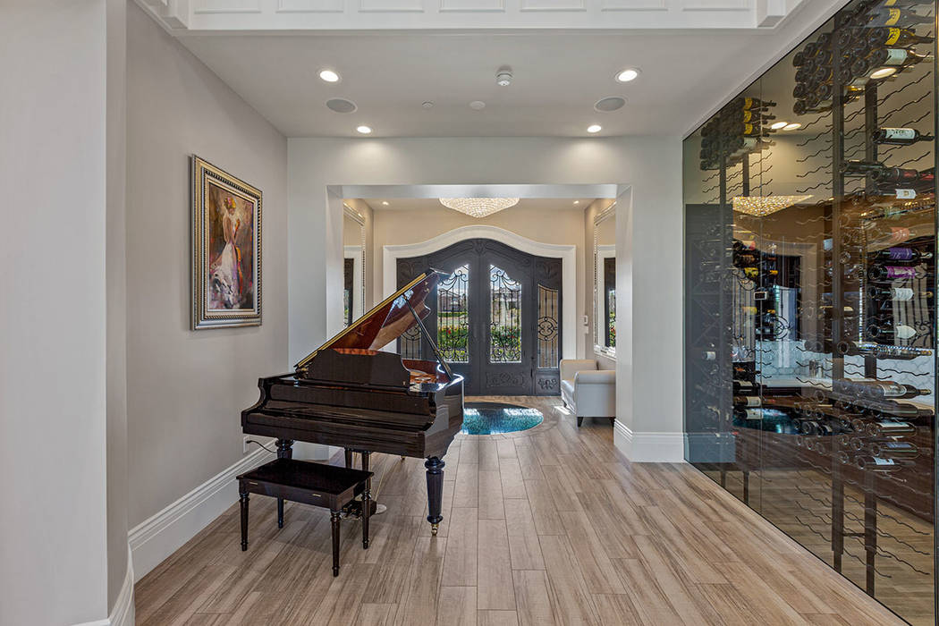 The entry leads to a wine room. (Ivan Sher Group)