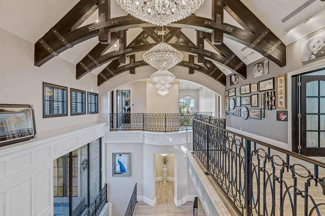 The two-story home is adorned with LED crystal chandeliers. (Ivan Sher Group)