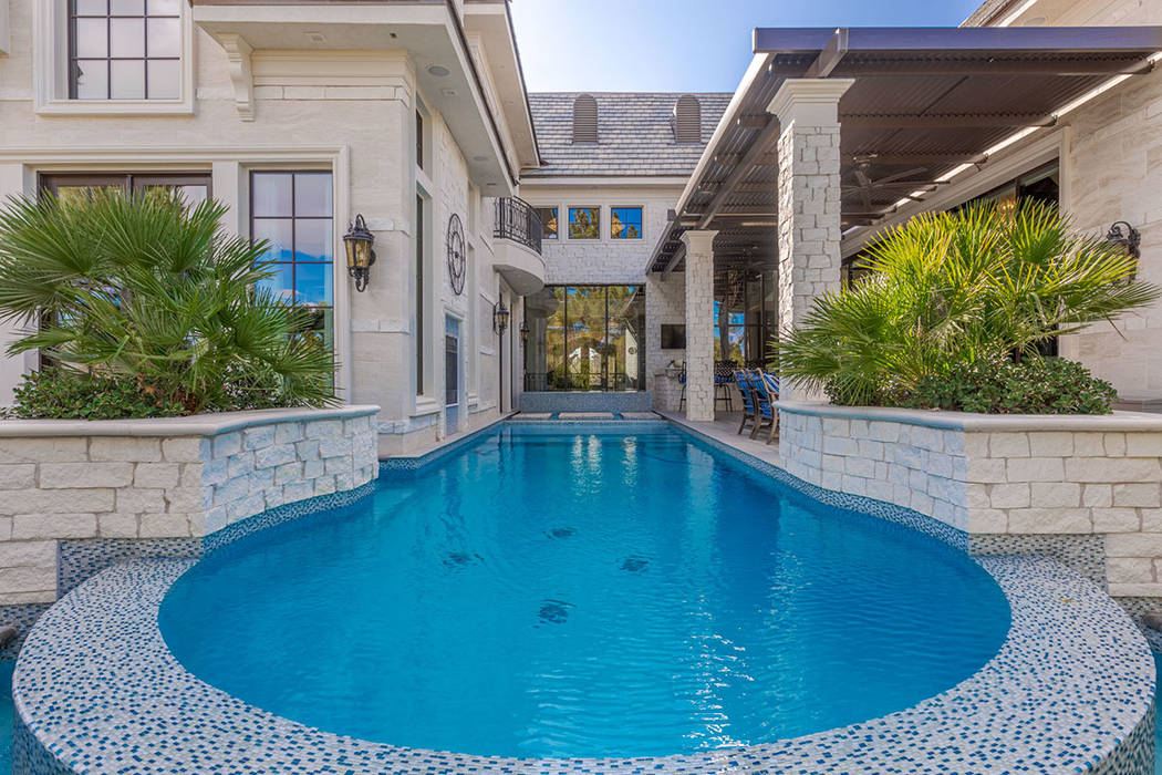 The pool leads to the back door. (Ivan Sher Group)