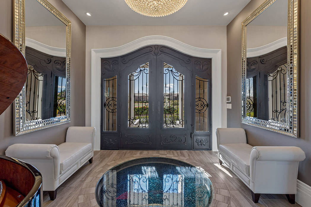 Clear glass windows are built into the floors of the main entryway and the office that offer di ...